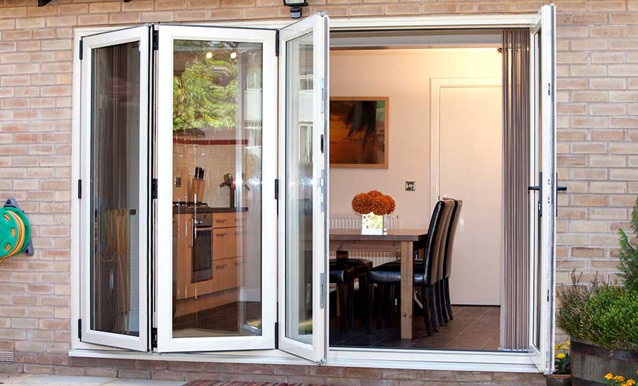 Bifold doors opening to dining area